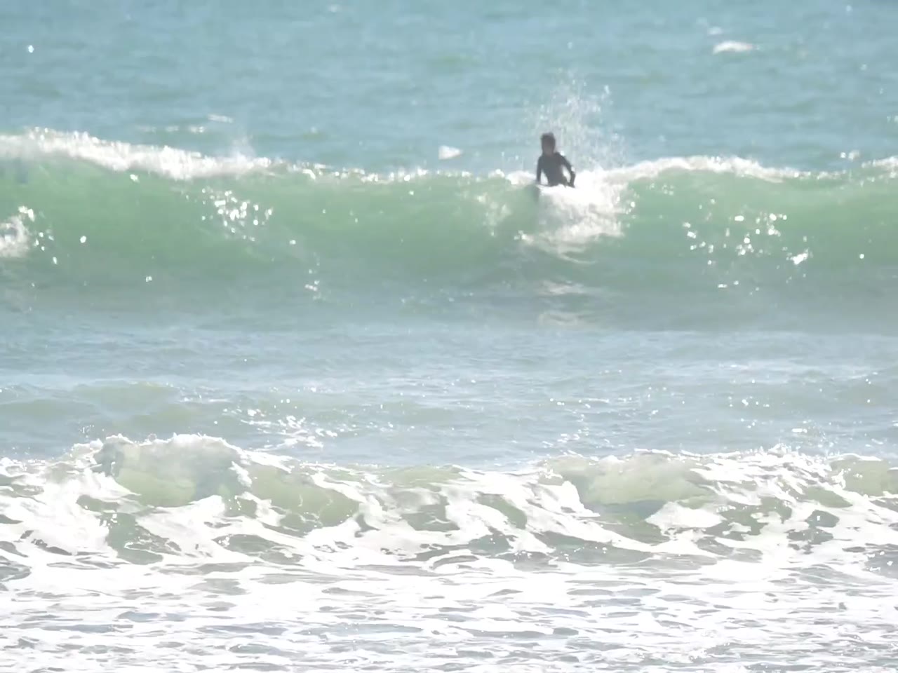 Jay Reyner surfing