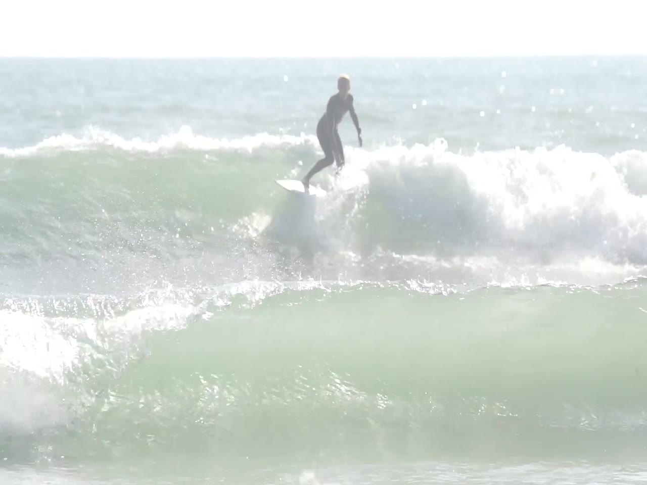 Jay Reyner surfing