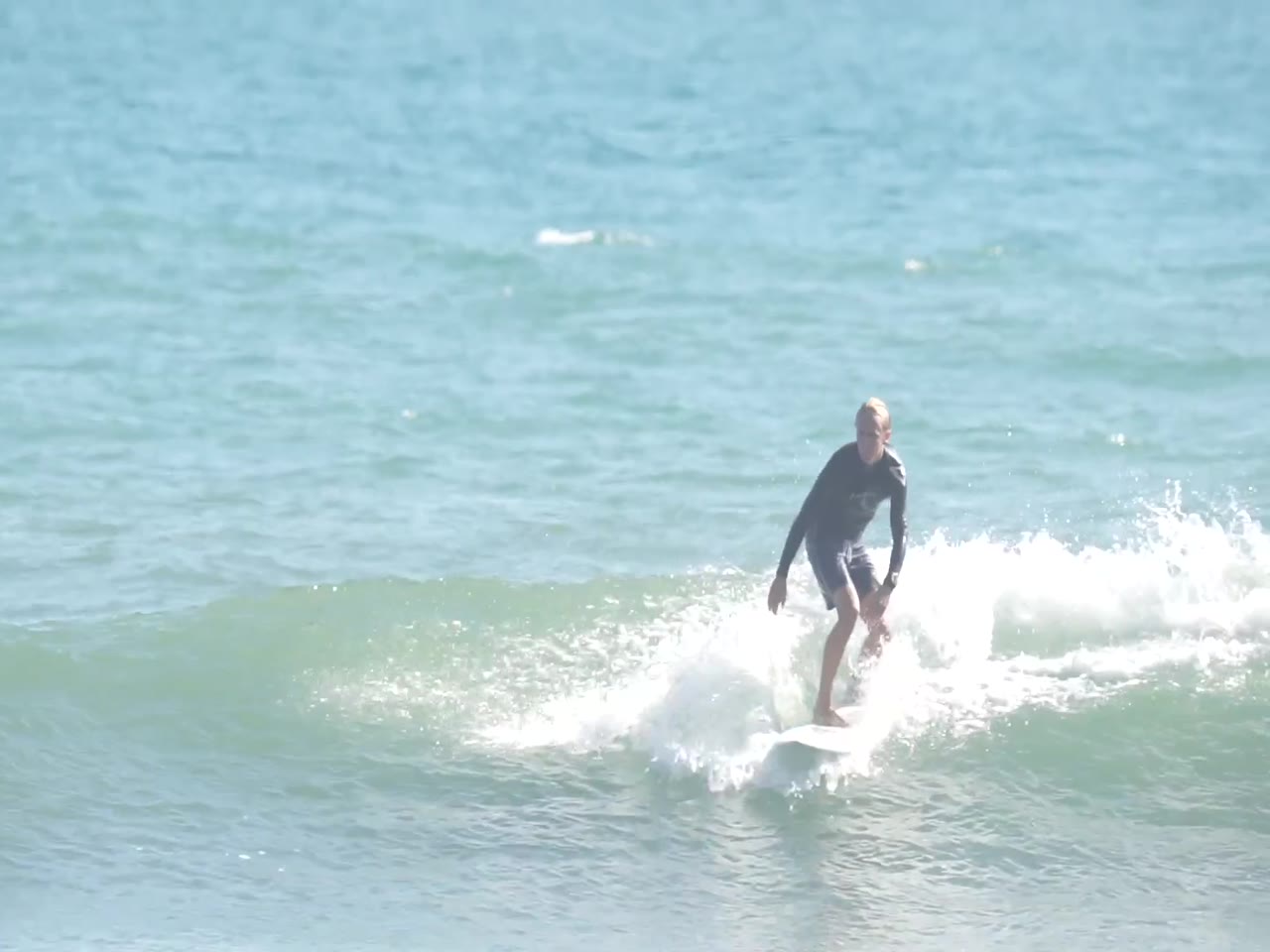 Jay Reyner surfing