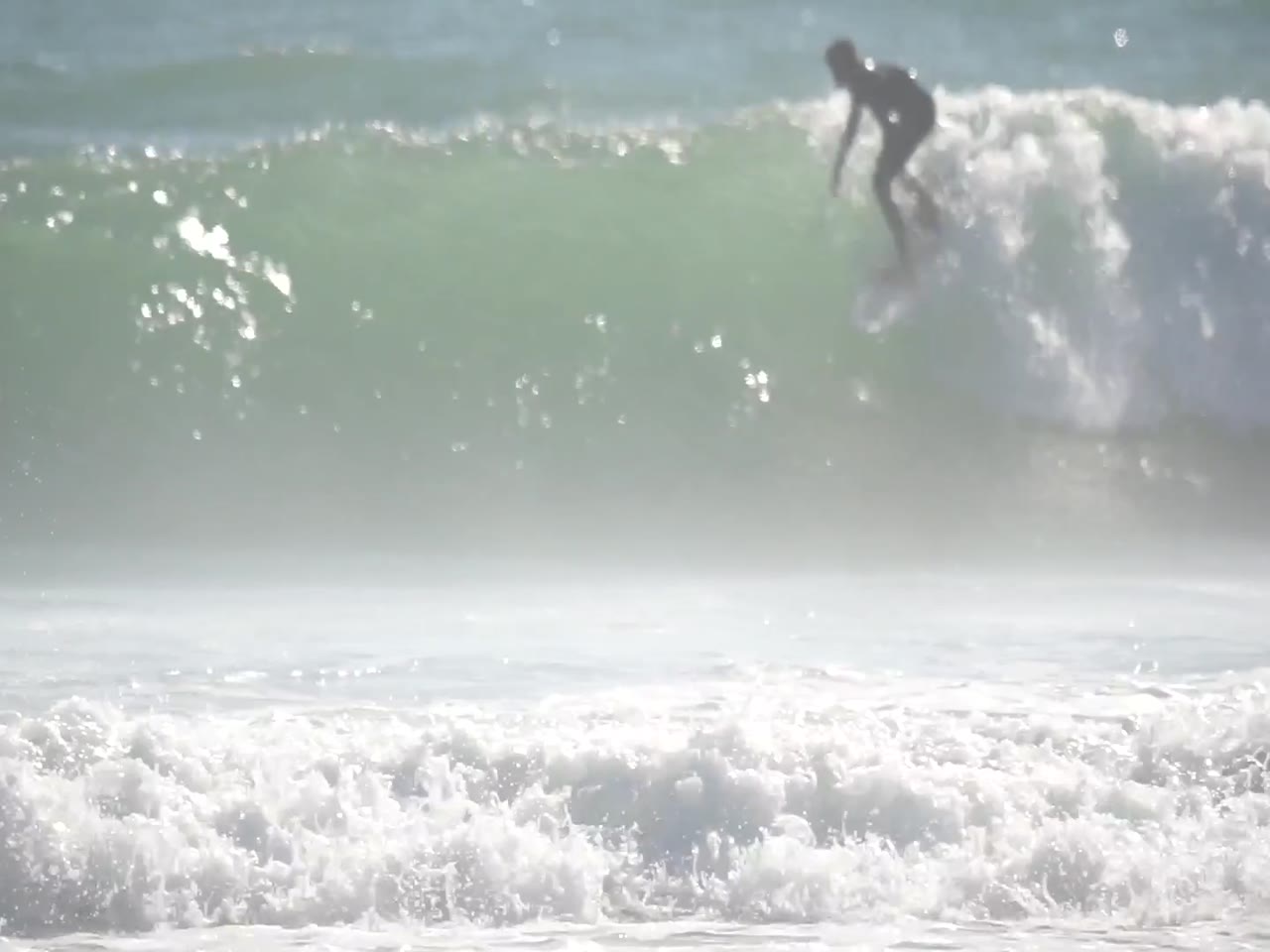 Micco Jacobsen surfing