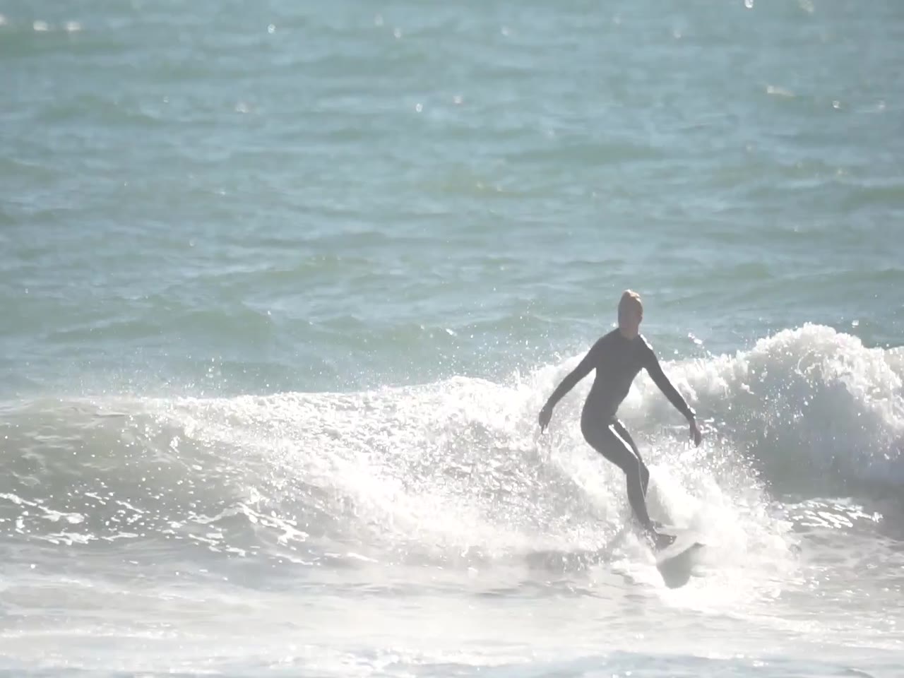 Jay Reyner surfing