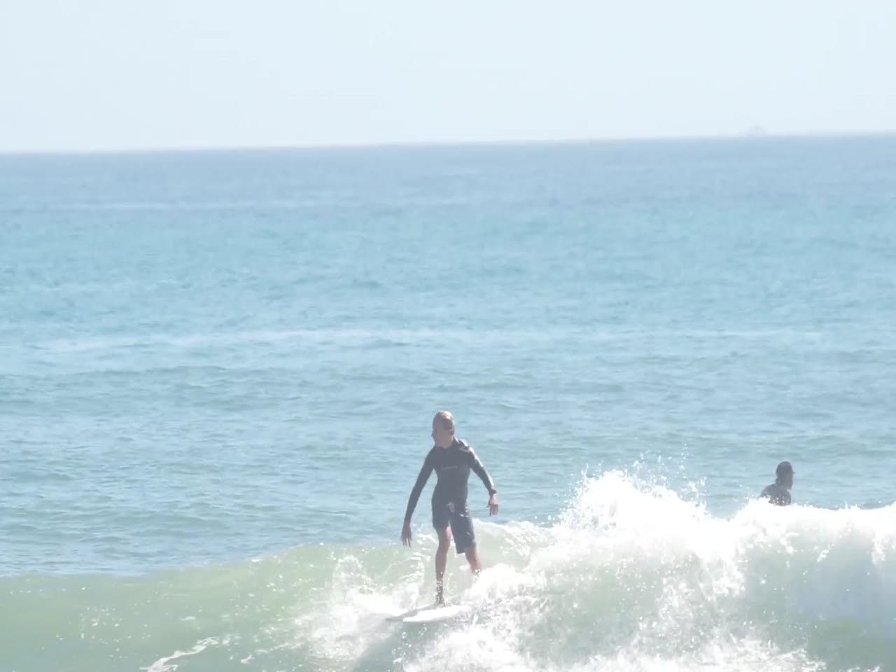 Jay Reyner surfing