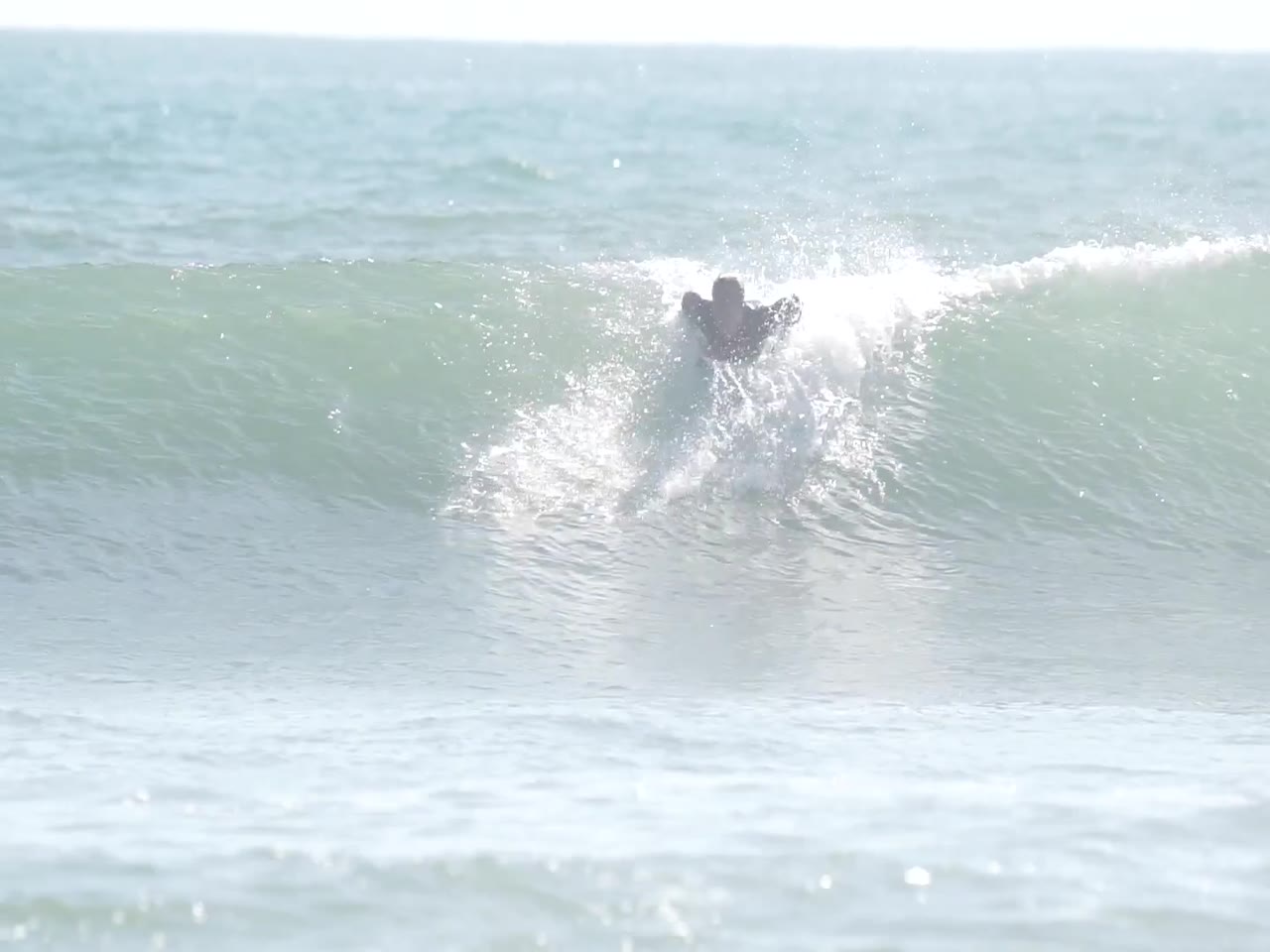 Jay Reyner surfing