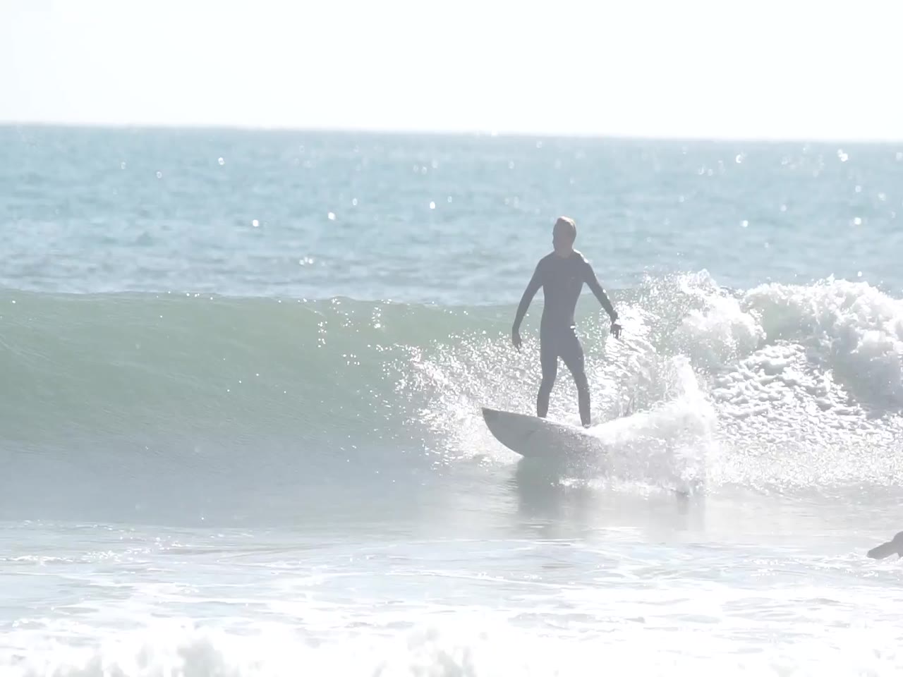 Jay Reyner surfing