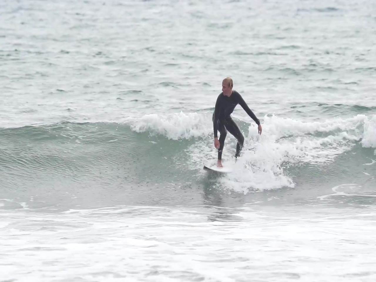 Jay Reyner surfing