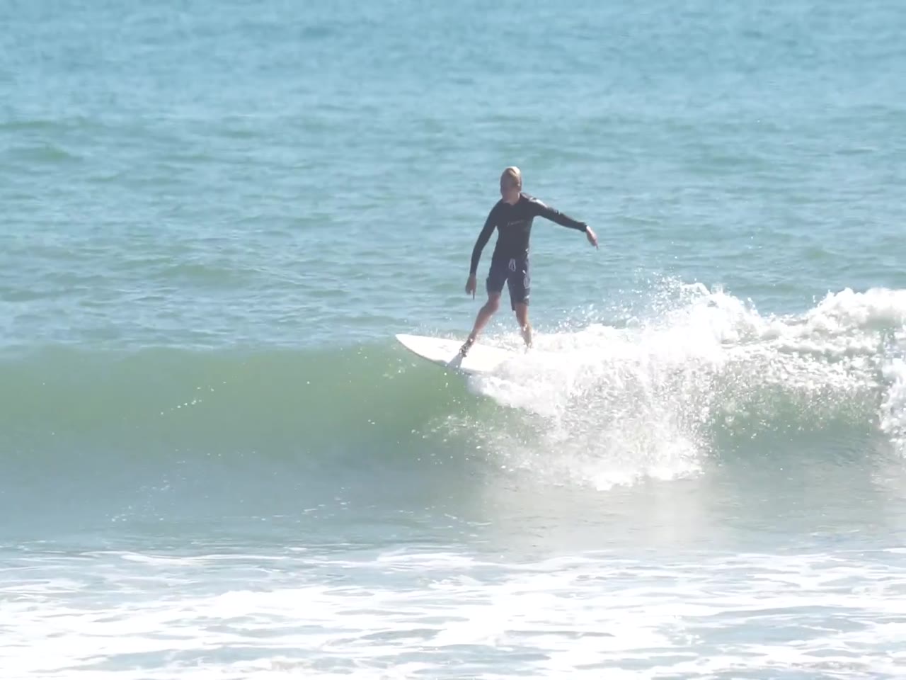 Jay Reyner surfing