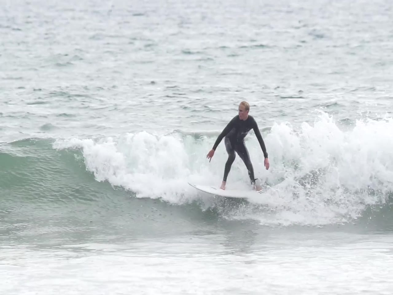 Jay Reyner surfing