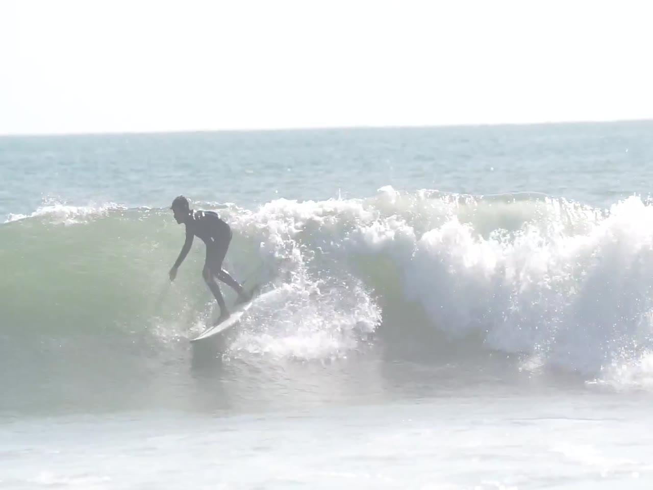 Micco Jacobsen surfing