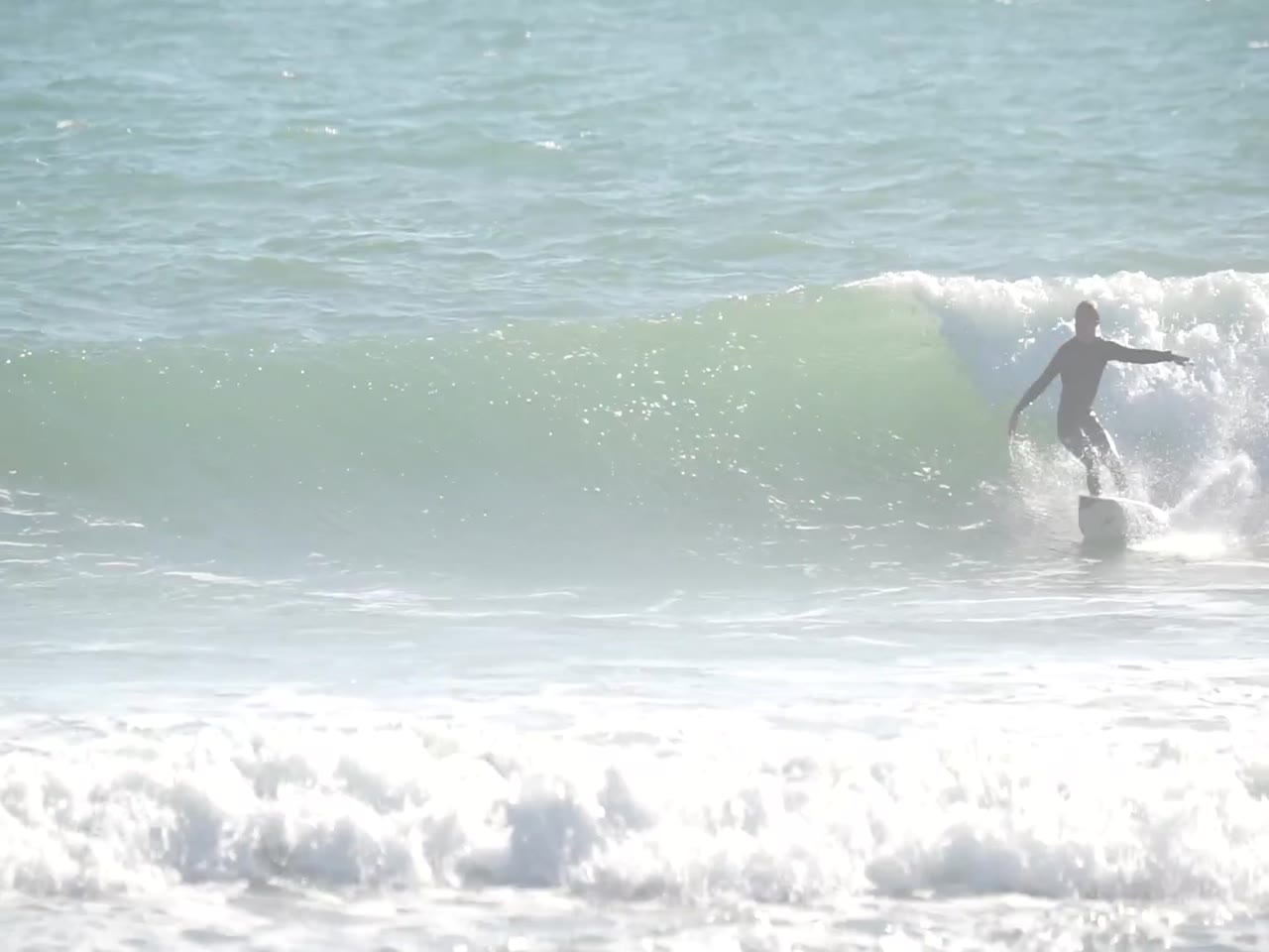 Jay Reyner surfing