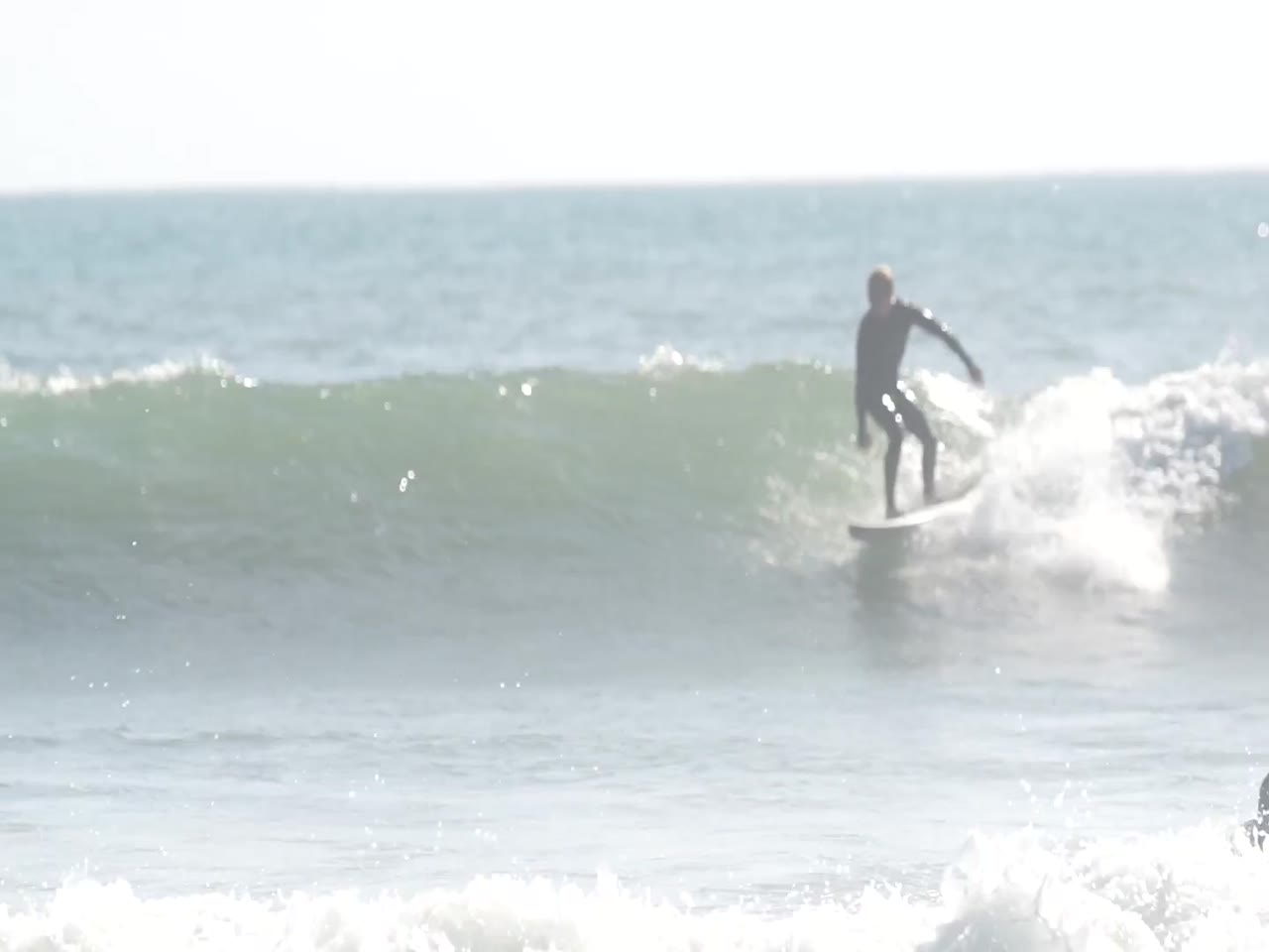 Jay Reyner surfing
