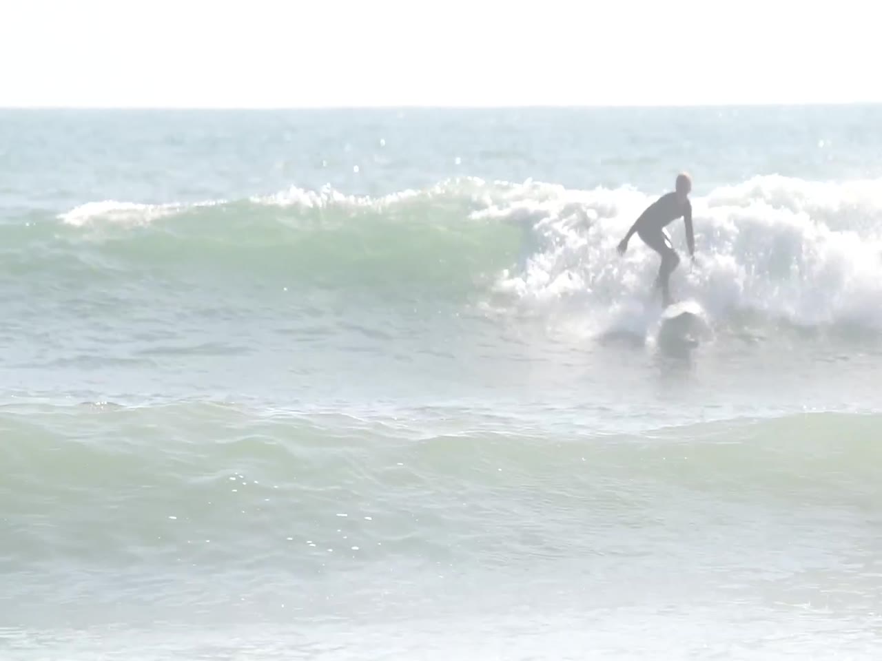 Jay Reyner surfing