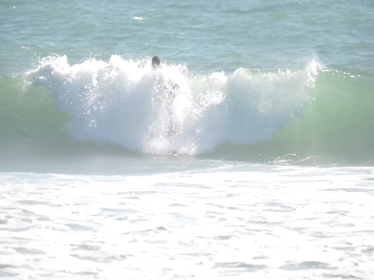 Micco Jacobsen surfing