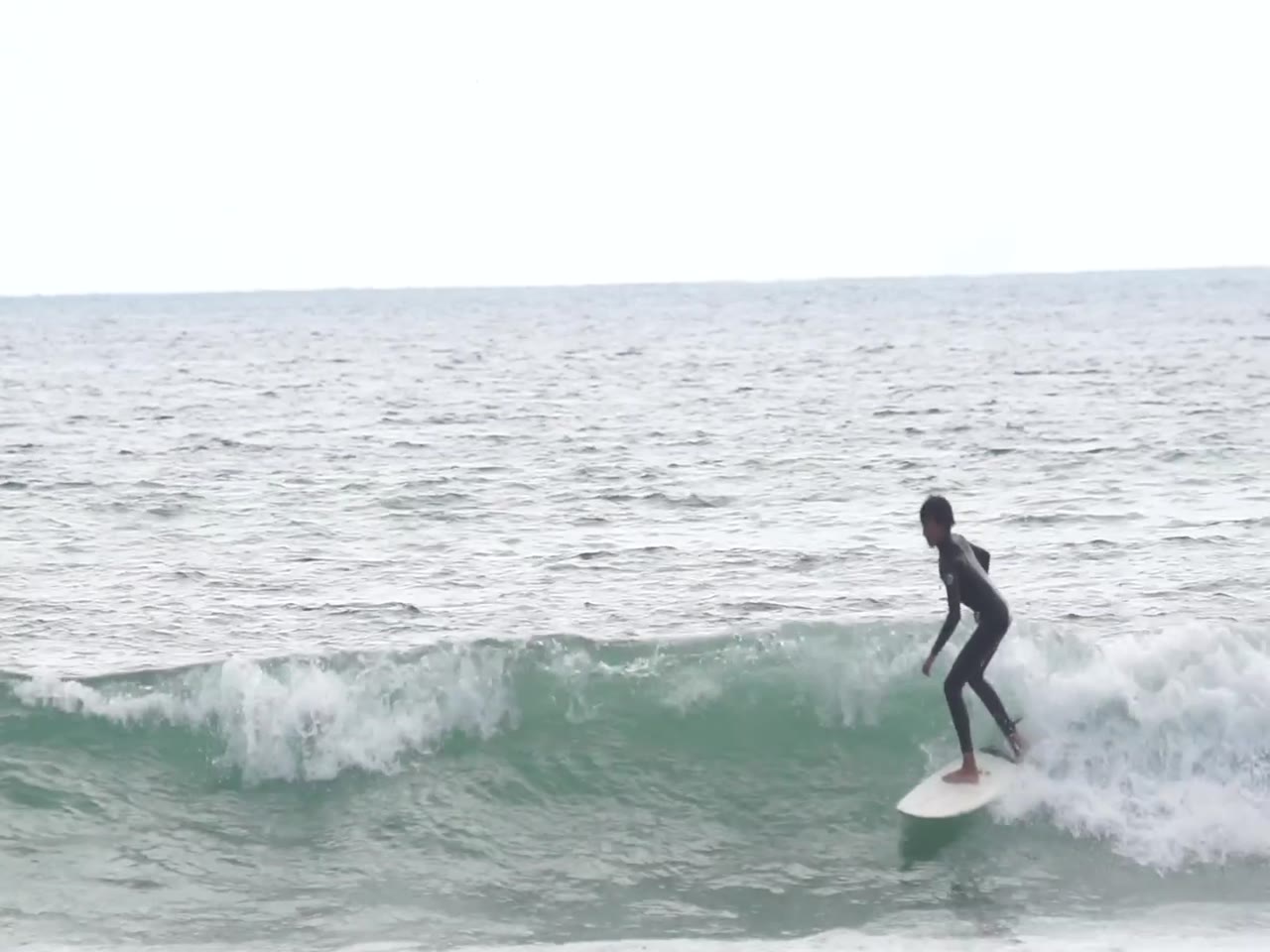 Micco Jacobsen surfing