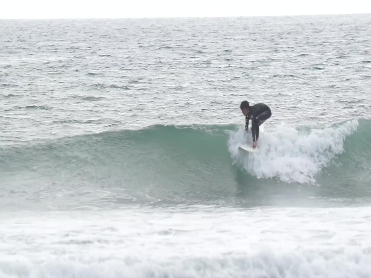 Micco Jacobsen surfing